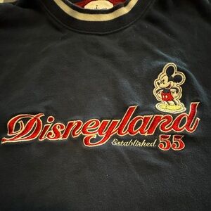 Men gently worn embroidered Disneyland Resort Mickey Mouse long sleeved sweater.